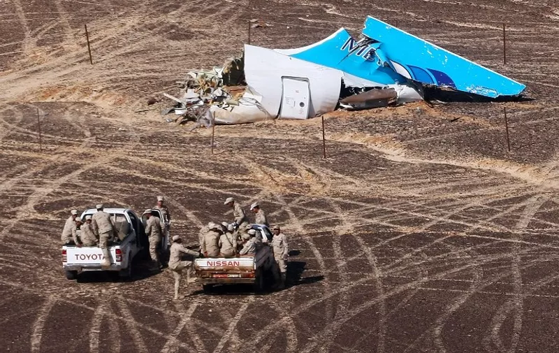 A handout picture taken on November 1, 2015 and released on November 3, 2015 by Russia's Emergency Ministry shows the wreckage of a A321 Russian airliner in Wadi al-Zolomat, a mountainous area of Egypt's Sinai Peninsula. Russian airline Kogalymavia's flight 9268 crashed en route from Sharm el-Sheikh to Saint Petersburg on October 31, killing all 224 people on board, the vast majority of them Russian tourists. AFP PHOTO / RUSSIA'S EMERGENCY MINISTRY / MAXIM GRIGORYEV
*RESTRICTED TO EDITORIAL USE - MANDATORY CREDIT "AFP PHOTO / RUSSIA'S EMERGENCY MINISTRY / MAXIM GRIGORYEV" - NO MARKETING NO ADVERTISING CAMPAIGNS - DISTRIBUTED AS A SERVICE TO CLIENTS *