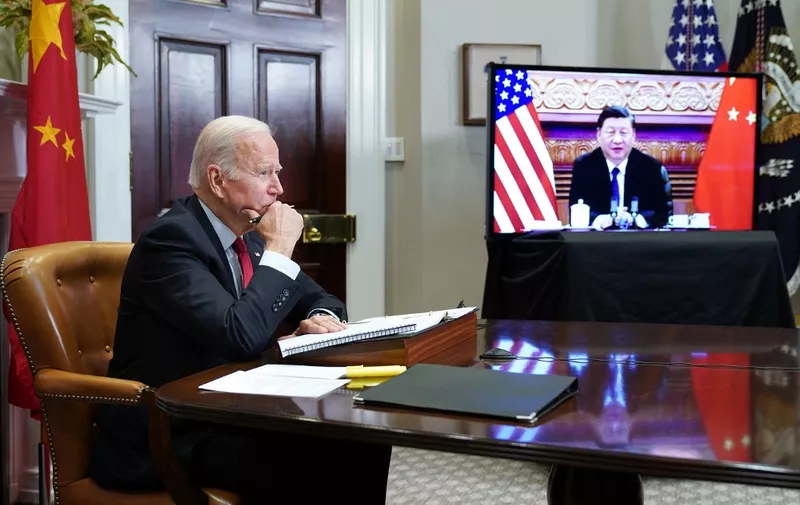 US President Joe Biden meets with China's President Xi Jinping during a virtual summit from the Roosevelt Room of the White House in Washington, DC, November 15, 2021. (Photo by MANDEL NGAN / AFP)
