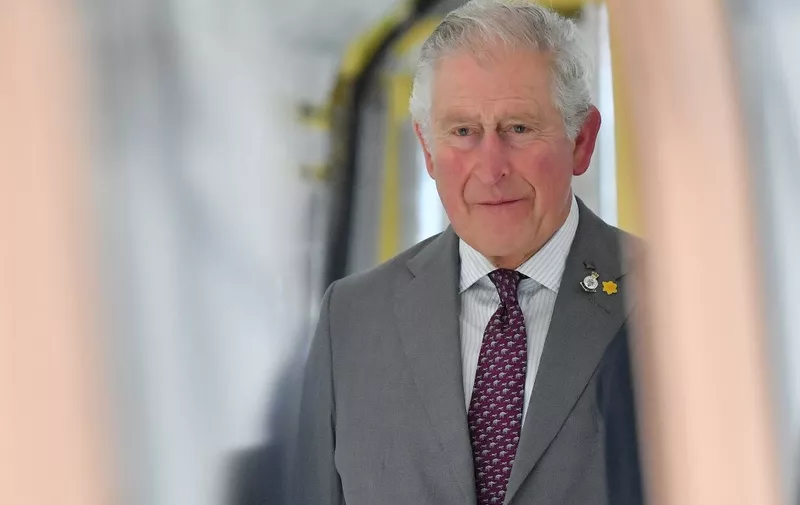 Britain's Prince Charles, Prince of Wales goes onboard a partly constructed train during a visit to the CAF train factory in Newport, Wales on February 21, 2020. - Newport is CAFs state-of-the-art train manufacturing facility completed in 2017, currently employing around 220 people. (Photo by Ben Birchall / POOL / AFP)