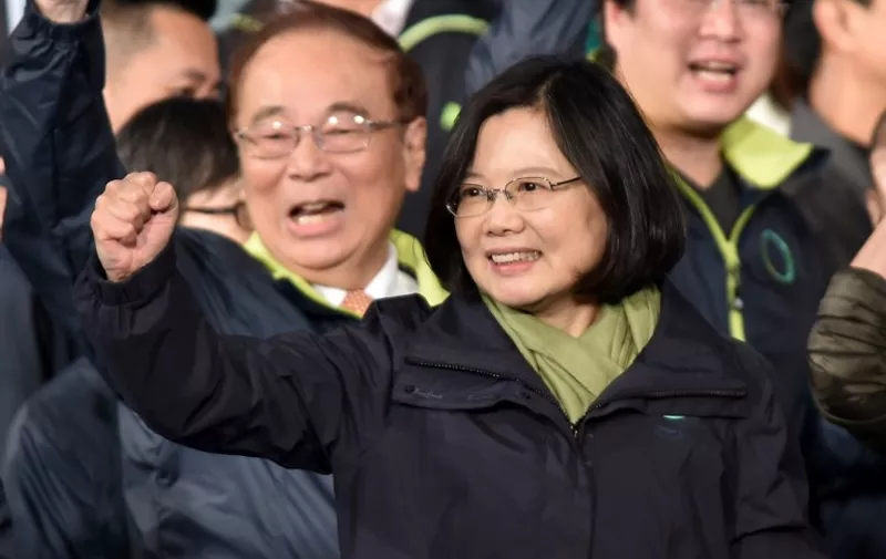 CORRECTS BYLINE

Democratic Progressive Party (DPP) presidential candidate Tsai Ing-wen gestures as she celebrates her victory inTaipei on January 15, 2016.  Voters in Taiwan elected a Beijing-sceptic president in a dramatic democratic journey, carving their own political path against China's wishes. AFP PHOTO / Sam Yeh / AFP / SAM YEH