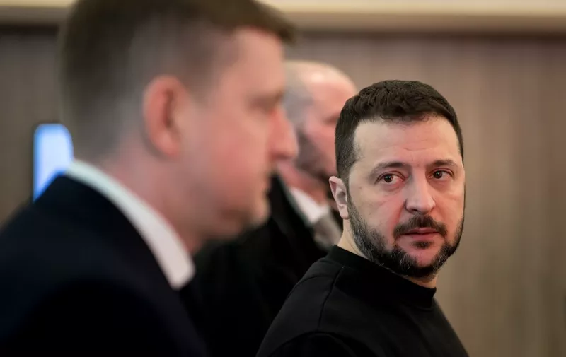 Ukrainian President Volodymyr Zelensky looks on leaving his meeting with  US National Security Advisor and US Secretary of State during the annual meeting of the World Economic Forum (WEF) in Davos on January 16, 2024. (Photo by Fabrice COFFRINI / AFP)