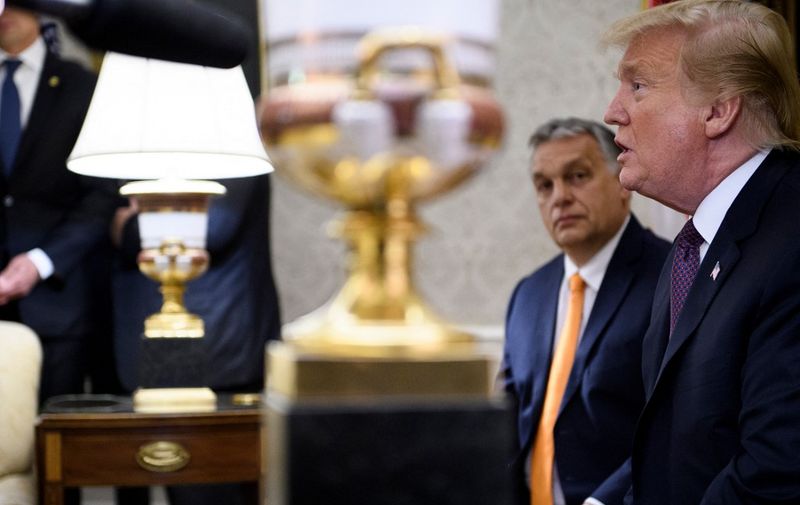 Hungary's Prime Minister Viktor Orban listens while US President Donald Trump speaks to the press before a meeting in the Oval Office of the White House on May 13, 2019, in Washington, DC. (Photo by Brendan Smialowski / AFP)