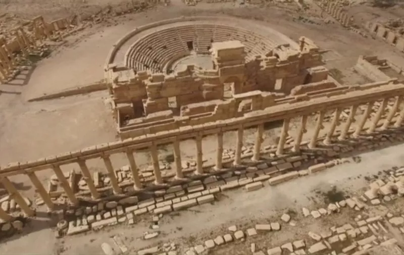 A screengrab made on March 27, 2016 from pictures shot by a Russian drone and released by the All-Russia State Television and Radio Broadcasting Company (VGRTK) shows a part of the ancient city of Palmyra, recaptured by Syrian troops from the Islamic state. / AFP / VGRTK AND AFP / - /  - Ukraine OUT - Russia OUT / RESTRICTED TO EDITORIAL USE - MANDATORY CREDIT "AFP PHOTO / VGRTK /" - NO MARKETING NO ADVERTISING CAMPAIGNS - DISTRIBUTED AS A SERVICE TO CLIENTS