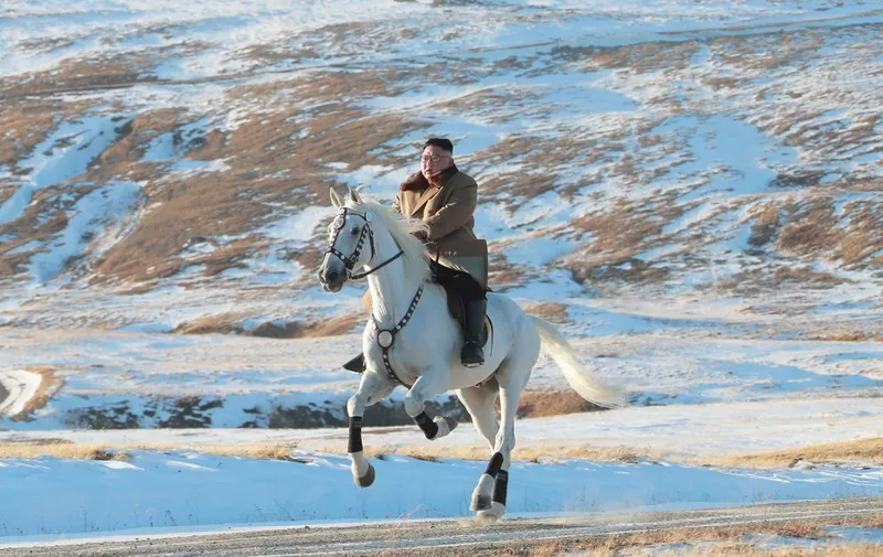 - AFP PICTURES OF THE YEAR 2019 - 

This undated picture released by Korean Central News Agency on October 16, 2019 shows North Korean leader Kim Jong Un riding a white horse amongst the first snow at Mouth Paektu. (Photo by STR / KCNA VIA KNS / AFP) / - South Korea OUT / REPUBLIC OF KOREA OUT   ---EDITORS NOTE--- RESTRICTED TO EDITORIAL USE - MANDATORY CREDIT "AFP PHOTO/KCNA VIA KNS" - NO MARKETING NO ADVERTISING CAMPAIGNS - DISTRIBUTED AS A SERVICE TO CLIENTS
THIS PICTURE WAS MADE AVAILABLE BY A THIRD PARTY. AFP CAN NOT INDEPENDENTLY VERIFY THE AUTHENTICITY, LOCATION, DATE AND CONTENT OF THIS IMAGE / AFP PICTURES OF THE YEAR 2019