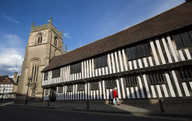 The former King Edward VI Grammar School and Guildhall where British poet and playwright William Shakespeare attended is pictured in Stratford-upon-Avon central England on April 12, 2016.
William Shakespeare's hometown is bracing for a surge in visitors from around the world this month as it marks 400 years since the death of the foremost playwright in the English language. A parade to Shakespeare's grave and fireworks will round off a day of theatre, dancing, music and parades in the picture-postcard streets of Stratford-upon-Avon. Some of Britain's finest actors are returning to the town's Royal Shakespeare Theatre to perform his most celebrated scenes, in a special show on the April 23 anniversary.
 / AFP PHOTO / Jack Taylor / To Go with AFP story by ROBIN MILLARD