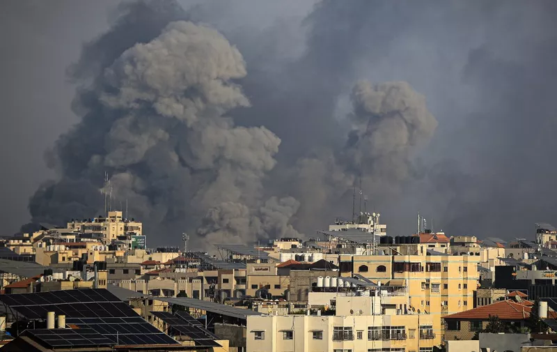 Smoke billows during Israeli strikes on Gaza City on October 10, 2023. Israel said it recaptured Gaza border areas from Hamas as the war's death toll passed 3,000 on October 10, the fourth day of gruelling fighting since the Islamists launched a surprise attack. (Photo by IBRAHIM HAMS / AFP)