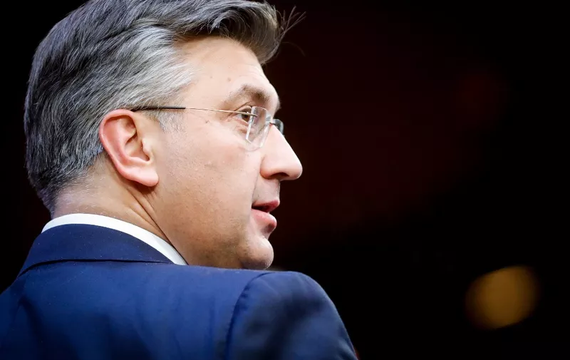 Croatian Prime Minister Andrej Plenkovic leaves a European Union (EU) summit at the European Council Building at the EU headquarters in Brussels on December 17, 2021. (Photo by STEPHANIE LECOCQ / POOL / AFP)