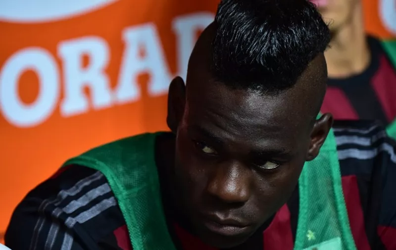 AC Milan's forward from Italy Mario Balotelli looks on before the Italian Serie A football match between AC Milan and Empoli  at San Siro Stadium in Milan on August 29, 2015. AFP PHOTO / GIUSEPPE CACACE