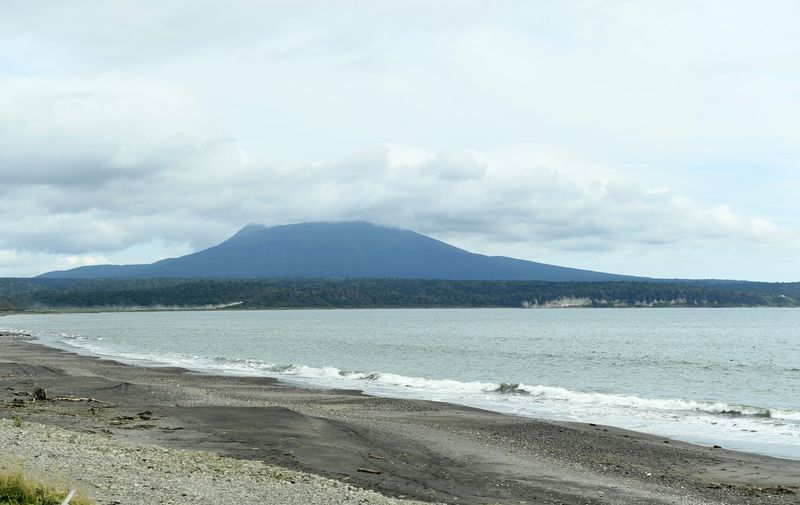 2935687 13.09.2016 The active Mendeleev Volcano in the south of the Kunashir Island of the Greater Kuril Ridge, on the coast of the Pacific Ocean.,Image: 699072465, License: Rights-managed, Restrictions: Editors' note: THIS IMAGE IS PROVIDED BY RUSSIAN STATE-OWNED AGENCY SPUTNIK., Model Release: no