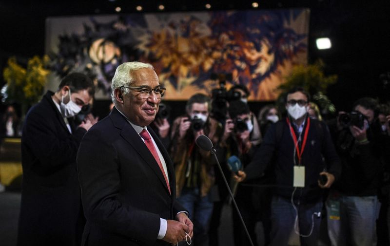 Portuguese incumbent Prime Minister and leader of the Socialist party (PS) Antonio Costa talks to journalists upon his arrival at his campaign headquarters in Lisbon on January 30, 2022, ahead of the election results. - Portugal voted in a close-fought election, with no party expected to win a majority in parliament in a fragmented political landscape that could see the far right make huge gains. (Photo by PATRICIA DE MELO MOREIRA / AFP)