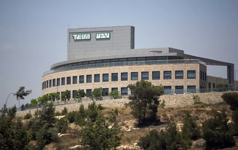 (FILES) This June 11, 2013 file photo shows the outside of the factory of Israel&#8217;s Pharmaceutical Industries Teva in Jerusalem. Israel&#8217;s Teva Pharmaceutical on April 21, 2015 launched an unsolicited bid to buy Mylan for $40.1 billion in a transaction that would create a behemoth in generic drugs. Teva&#8217;s cash-and-stock bid would quash an unsolicited [&hellip;]