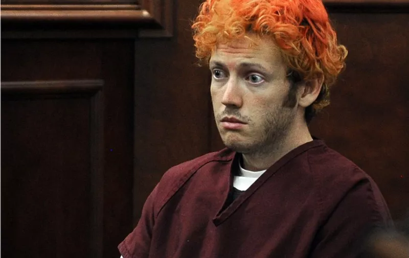 (FILES): This July 23, 2012 file photo shows James Holmes appearing in court at the Arapahoe County Justice Center  in Centennial, Colorado. A judge on August 26, 2015 sentenced the Aurora, Colorado theater shooter to life in prison without parole plus 3,318 consecutive years, ending a three-year saga that began when Holmes walked into a darkened auditorium on July 20, 2012 and opened fire fatally shooting 12 people and wounding 70 more before his gun jammed.   AFP PHOTO / FILES  / POOL /RJ SANGOSTI