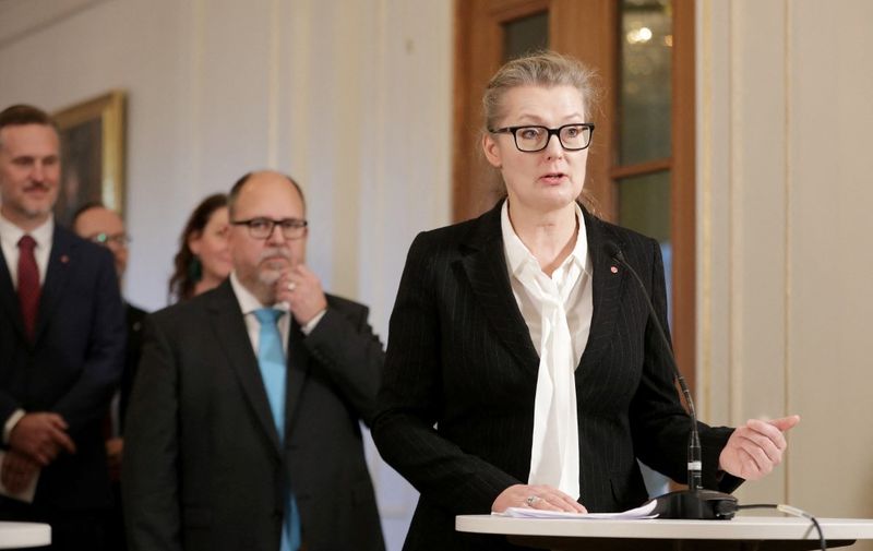 Sweden's new Schools Minister Lina Axelsson Kihlblom (R) speaks to the media after new Swedish Prime Minister Andersson (not pictured) presented her new government during a press conference following the government declaration at the Swedish Riksdag in Stockholm on November 30, 2021. - Sweden's new Schools Minister Lina Axelsson Kihlblom on November 30 became the first transgender person to be appointed a government minister in the Nordic country, a year after a Belgian first in Europe. (Photo by Soren ANDERSSON / TT News Agency / AFP) / Sweden OUT