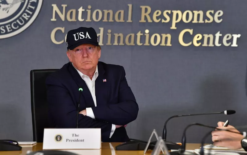 US President Donald Trump receives a briefing at the Federal Emergency Management Administration (FEMA) on Hurricane Dorian in Washington, DC, on September 1, 2019. (Photo by Nicholas Kamm / AFP)