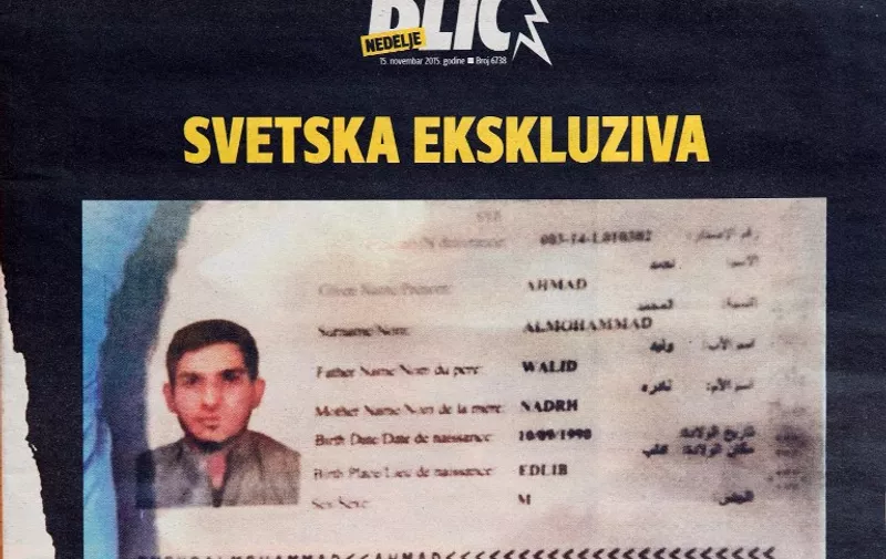 A photo taken in Belgrade on November 15, 2015 shows the frontpage of Serbian magazine Blic, displaying a Syrian passport found by police at the scene of one of the Paris attacks. The passport was issued to Ahmad alMohammad, an asylum seeker who had taken the migrants' route through the Balkans, Greece's migration minister said on November 15. AFP PHOTO / ANDREJ ISAKOVIC
