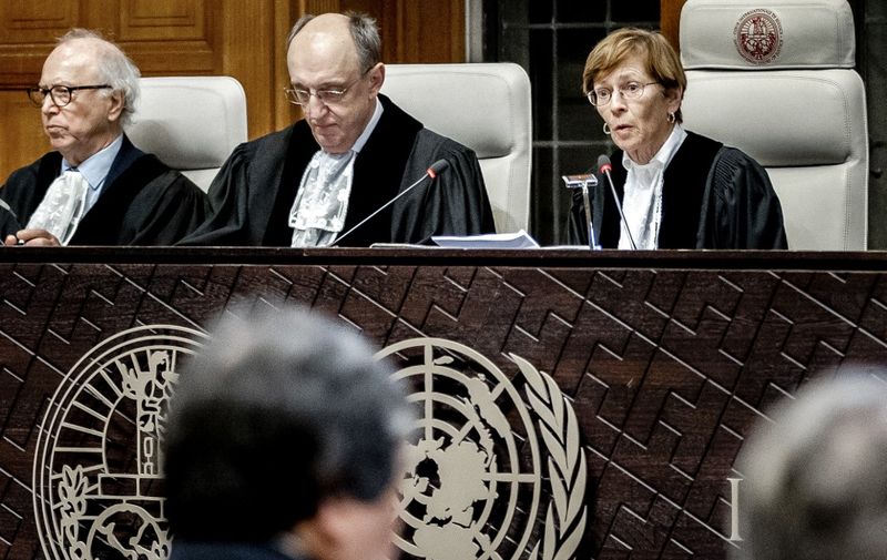 ICJ President Joan Donoghue (R) speaks during a hearing at the International Court of Justice (ICJ) prior to the ruling in a lawsuit brought by Ukraine against Russia in 2017, for the downing of flight MH17, in The Hague, on January 31, 2024. (Photo by Remko de Waal / ANP / AFP) / Netherlands OUT