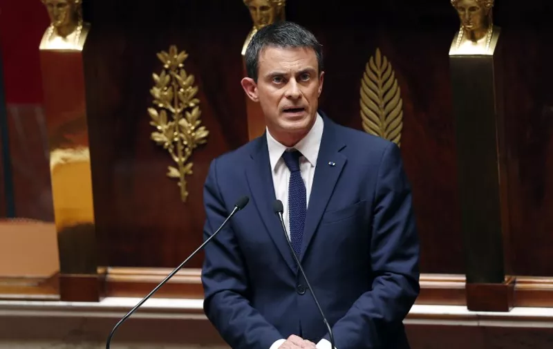 French Prime minister Manuel Valls speaks at the National Assembly, French Parliament lower house, on July 8, 2015 in Paris during a debate on the Greek situation, a day after Greece agreed to the new reforms in the coming weeks in exchange for a three-year loan by the ESM, the new Greek Finance Minister said the day before.    AFP PHOTO / THOMAS SAMSON