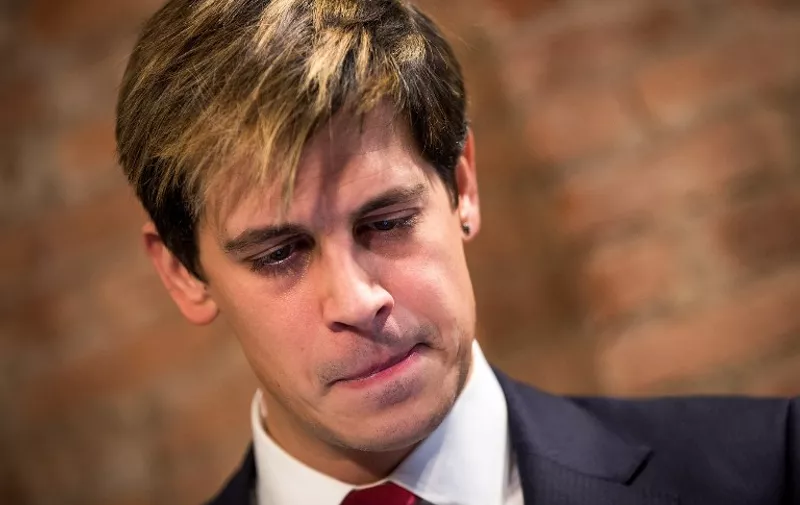 NEW YORK, NY - FEBRUARY 21: Milo Yiannopoulos speaks during a press conference, February 21, 2017 in New York City. After comments he made regarding pedophilia surfaced in an online video, Yiannopoulos resigned from his position at Brietbart News, was uninvited to speak at the Conservative Political Action Conference (CPAC) and lost a major book deal with Simon &amp; Schuster.   Drew Angerer/Getty Images/AFP