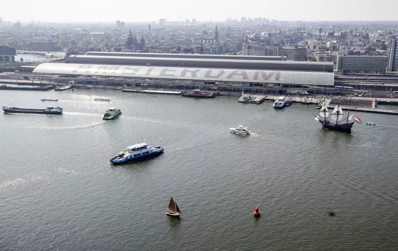 A general view shows the river IJ and the city of Amsterdam on August 12, 2020. The Sail Amsterdam 2020 event would have taken place here, but was cancelled due to the coronavirus pandemic. (Photo by Robin VAN LONKHUIJSEN / ANP / AFP) / Netherlands OUT