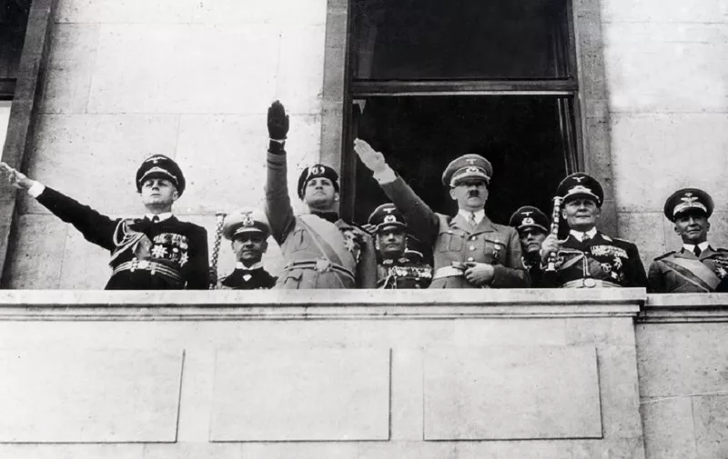 German Nazi leader Adolf Hitler (3rd R) gives a Heil Hitler salute to the crowd from a balcony with German Foreign minister Joachim von Ribbentrop (L), Italian Foreign Minister Galeazzo Ciano (2nd L), Commander of the Luftwaffe Hermann Goering (2nd R) and Italian General Pariani (R) in a picture dated 1939. AFP PHOTO FRANCE PRESSE VOIR / AFP PHOTO / FRANCE PRESSE VOIR