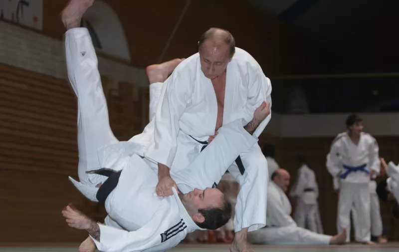 Russian Prime Minister Vladimir Putin, right, conducts a judo training session at Top Athletic School during his working visit to St Petersburg, 18 December 2009.,Image: 48658598, License: Rights-managed, Restrictions: , Model Release: no, Credit line: Profimedia