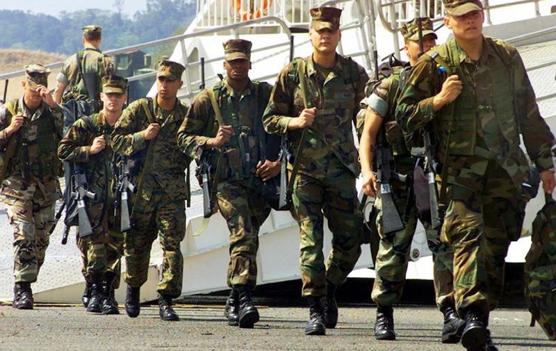 US troops arrive in Subic Bay, a former US naval base in the northern Philippines, 17 April 2003 from their base in Okinawa, Japan, to take part in joint military exercises with Filipino troops.  The war games would be held from April 25 to May 09. The exercise will involve cross-training between the Philippine and US armed forces as well as humanitarian civil assistance exercises including medical, dental, veterinarian and engineering civil assistance programs.          AFP PHOTO / AFP PHOTO / HO / STR