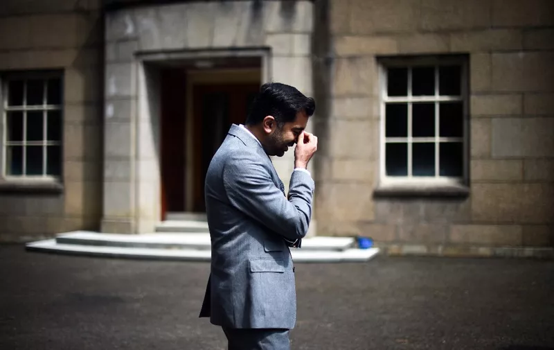 Scotland's First Minister Humza Yousaf reacts during a television interview whilst visiting SSE's hydro-electric power station on Loch Sloy, near Arrochar, western Scotland, on May 22, 2023. (Photo by Andy Buchanan / POOL / AFP)