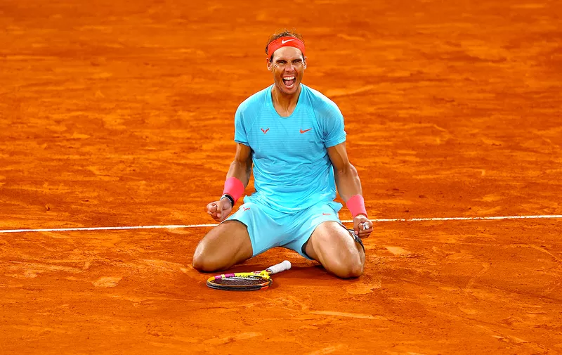 PARIS, FRANCE - OCTOBER 11: Rafael Nadal of Spain celebrates after winning championship point during his Men's Singles Final against Novak Djokovic of Serbia on day fifteen of the 2020 French Open at Roland Garros on October 11, 2020 in Paris, France. (Photo by Julian Finney/Getty Images)