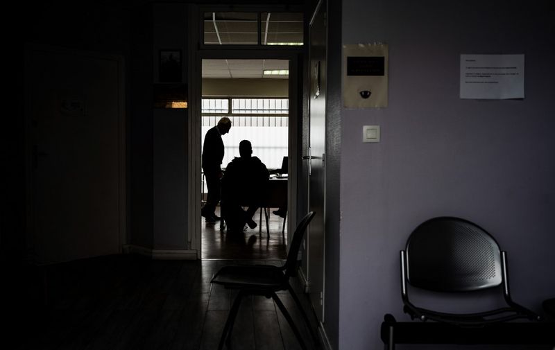 A doctor who is a member of the "Association Medecine et Droit d'Asile" (Medicine and right to asylum association) examines a refugee on April 2, 2019 in a medical care house in Lyon. - The conclusions of these psychological and clinical exams will be transmitted to the French Asylum Right national court (Cour nationale du droit d'asile, CNDA) to support the appeal files of the refugees whose asylum demands have been rejected by French Office for Refugees and Stateless Persons (OFPRA). (Photo by JEFF PACHOUD / AFP)