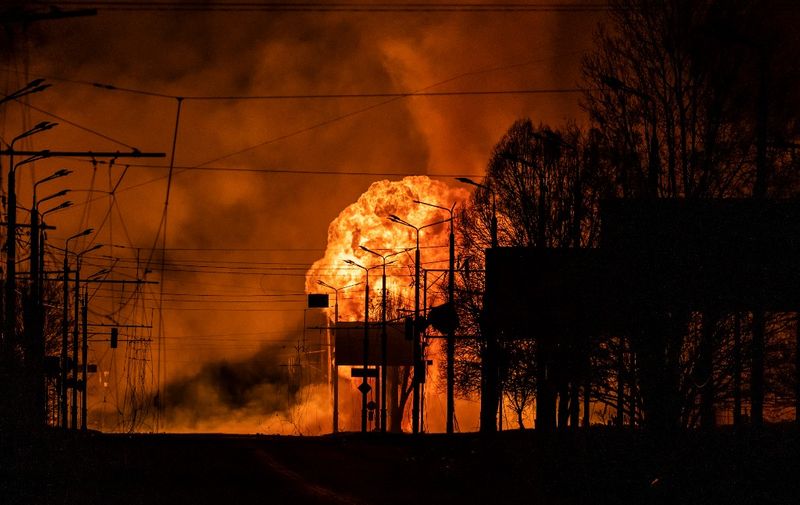 A gaz station burns after Russian attacks in the city of Kharkiv on March 30, 2022. - Russian forces are repositioning in Ukraine to strengthen their offensive on the Donbass, Nato said on March 31, 2022, on the 36th day of the Russian-Ukrainian conflict, as shelling continues in Kharkiv (north) and Mariupol (south). (Photo by FADEL SENNA / AFP) / The erroneous mention[s] appearing in the metadata of this photo by FADEL SENNA has been modified in AFP systems in the following manner: [March 30] instead of [March 31]. Please immediately remove the erroneous mention[s] from all your online services and delete it (them) from your servers. If you have been authorized by AFP to distribute it (them) to third parties, please ensure that the same actions are carried out by them. Failure to promptly comply with these instructions will entail liability on your part for any continued or post notification usage. Therefore we thank you very much for all your attention and prompt action. We are sorry for the inconvenience this notification may cause and remain at your disposal for any further information you may require.