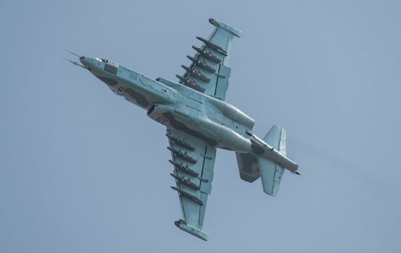 A Sukhoi SU-25 aircraft performs a fly-by during the first Wonsan Friendship Air Festival in Wonsan on September 24, 2016. Just weeks after carrying out its fifth nuclear test, North Korea put on an unprecedented civilian and military air force display on September 24 at the country's first ever public aviation show. (Photo by Ed Jones / AFP)