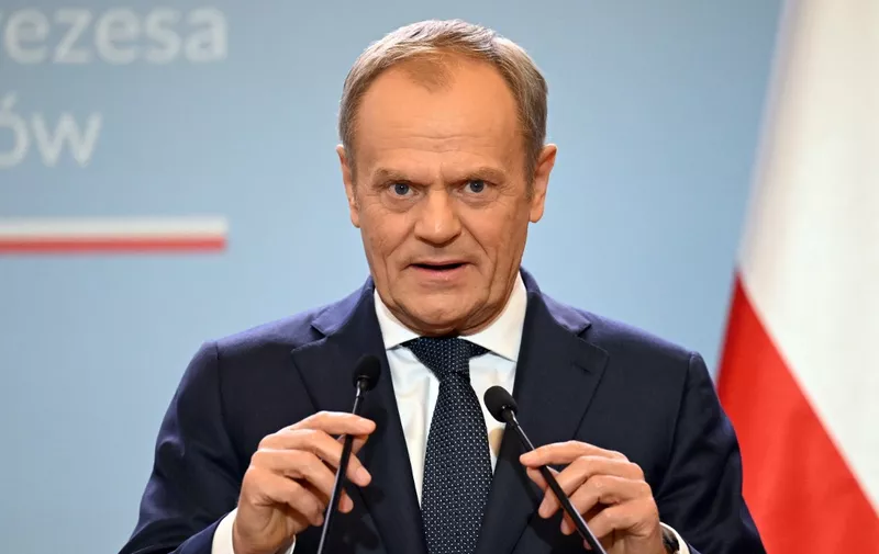 Polish Prime Minister Donald Tusk addresses a joint press conference with the Danish prime minister following talks in Warsaw, Poland on April 15, 2024. (Photo by Sergei GAPON / AFP)