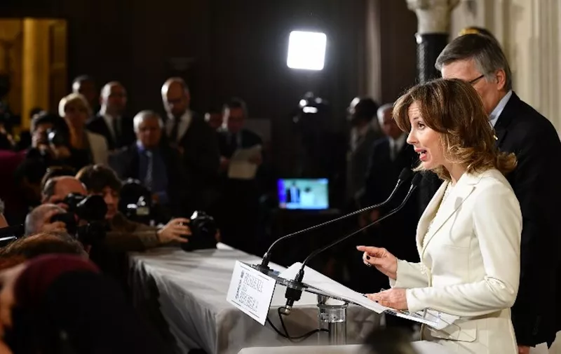 Luigi Gaetti (R) and and Giulia Grillo, representatives of the Five Star Movement (M5S) address journalists duringg a press point following a meeting with Italy's President Sergio Mattarella on December 10, 2016 at the Quirinale Palace in Rome. Representatives of Italy's main parties are headed to the presidential palace, their task to agree on a new government made even more urgent by fears of a banking crisis in the eurozone's third-largest economy. - Italy was plunged into political uncertainty by the resignation of Prime Minister Matteo Renzi following a crushing referendum defeat. (Photo by VINCENZO PINTO / AFP)