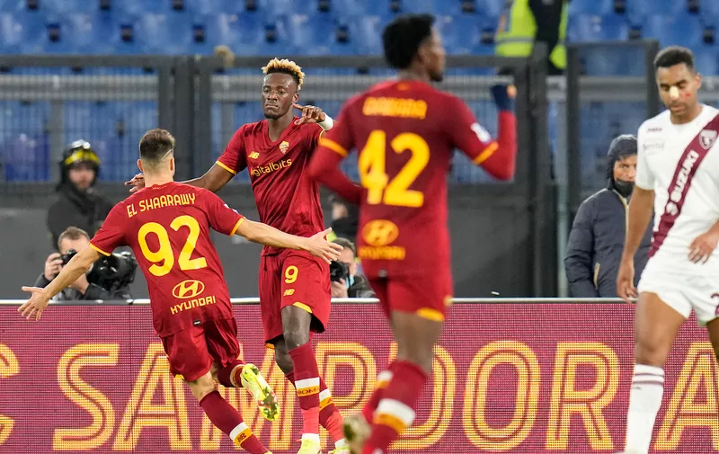 Roma's Tammy Abraham, 2nd left, celebrates after scoring his sides first goal during the Serie A soccer match between Roma and Torino at Rome's Olympic stadium, Sunday, Nov. 28, 2021. (AP Photo/Gregorio Borgia)