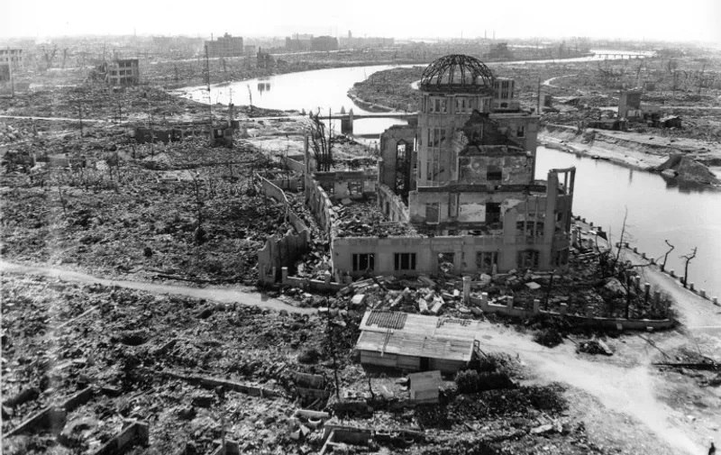 TO GO WITH AFP STORY "JAPAN-US-NUCLEAR-HISTORY-WWII-HIROSHIMA-ANNIVERSARY" BY HIROSHI HIYAMA
This handout picture taken on November, 1945 by US Army and released from Hiroshima Peace Memorial Museum shows the A-bomb Domea, three months after the atomic bomb was dropped by B-29 bomber Enola Gay over the city of Hiroshima. Charred bodies bobbed in the brackish waters that flowed through Hiroshima 70 years ago this week, after a once-vibrant Japanese city was consumed by the searing heat of the world's first nuclear attack. About 140,000 people are estimated to have been killed in the attack, including those who survived the bombing itself but died soon afterward due to severe radiation exposure.  AFP PHOTO / HIROSHIMA PEACE MEMORIAL PARK---EDITORS NOTE---HANDOUT RESTRICTED TO EDITORIAL USE - MANDATORY CREDIT "AFP PHOTO / HIROSHIMA PEACE MEMORIAL MUSEUM" - NO MARKETING NO ADVERTISING CAMPAIGNS - DISTRIBUTED AS A SERVICE TO CLIENTS