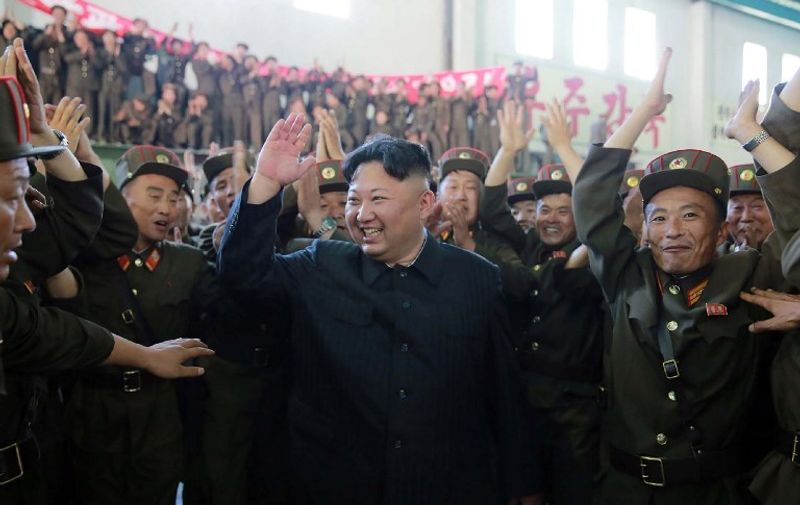 This picture taken on July 4, 2017 and released from North Korea's official Korean Central News Agency (KCNA) on July 5, 2017 shows North Korean leader Kim Jong-Un (C) celebrating the successful test-fire of the intercontinental ballistic missile Hwasong-14 at an undisclosed location.
South Korea and the United States fired off missiles on July 5 simulating a precision strike against North Korea's leadership, in response to a landmark ICBM test described by Kim Jong-Un as a gift to "American bastards". / AFP PHOTO / KCNA VIA KNS / STR / South Korea OUT / REPUBLIC OF KOREA OUT   ---EDITORS NOTE--- RESTRICTED TO EDITORIAL USE - MANDATORY CREDIT "AFP PHOTO/KCNA VIA KNS" - NO MARKETING NO ADVERTISING CAMPAIGNS - DISTRIBUTED AS A SERVICE TO CLIENTS
THIS PICTURE WAS MADE AVAILABLE BY A THIRD PARTY. AFP CAN NOT INDEPENDENTLY VERIFY THE AUTHENTICITY, LOCATION, DATE AND CONTENT OF THIS IMAGE. THIS PHOTO IS DISTRIBUTED EXACTLY AS RECEIVED BY AFP. 

 /