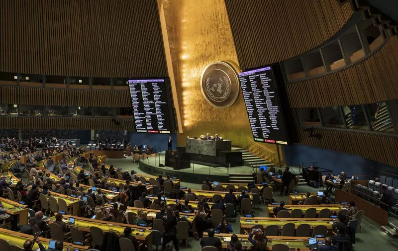 Screens display the vote count during the Eleventh Emergency Special Session of the General Assembly on Ukraine, at UN headquarters in New York City on February 23, 2023. - The United Nations voted overwhelmingly Thursday to demand Russia "immediately" and "unconditionally" withdraw its troops from Ukraine, marking the one-year anniversary of the war with a call for a "just and lasting" peace. (Photo by ANGELA WEISS / AFP)