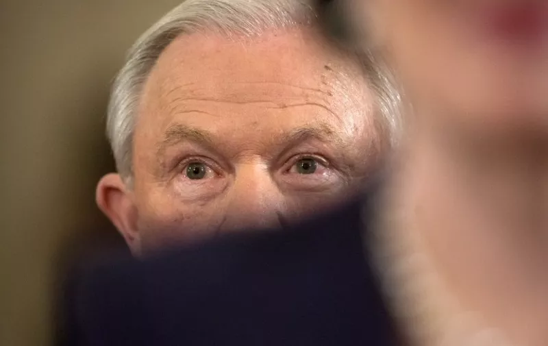 Sen. Jeff Sessions, R-Al, listens to opening statements prior to testifying at the Senate Judiciary Committee hearing on his nomination to be Attorney General of the US on January 10, 2017, in Washington, DC.   / AFP PHOTO / MOLLY RILEY