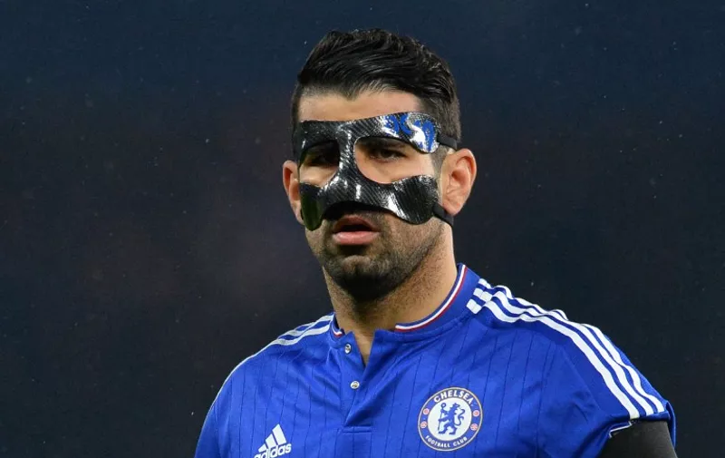 Chelsea's Brazilian-born Spanish striker Diego Costa wears a protective face mask during the English Premier League football match between Chelsea and Newcastle United at Stamford Bridge in London on February 13, 2016.  / AFP / GLYN KIRK / RESTRICTED TO EDITORIAL USE. No use with unauthorized audio, video, data, fixture lists, club/league logos or 'live' services. Online in-match use limited to 75 images, no video emulation. No use in betting, games or single club/league/player publications.  /