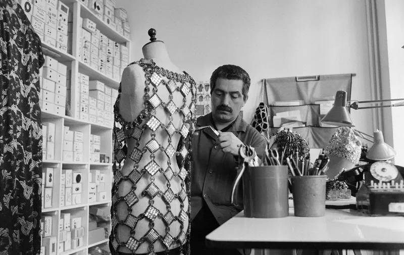 Portrait taken on July 10, 1979 shows French-Spanish fashion designer Paco Rabanne at his sewing workshop in Paris. (Photo by Pierre GUILLAUD / AFP)