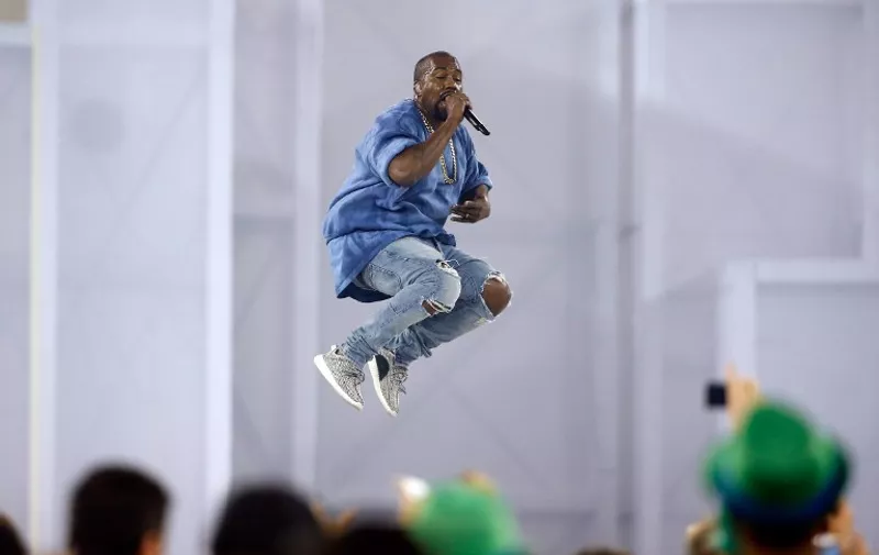 TORONTO, ON - JULY 26: Kanye West preforms during the closing ceremony on Day 16 of the Toronto 2015 Pan Am Games on July 26, 2015 in Toronto, Canada.   Ezra Shaw/Getty Images/AFP