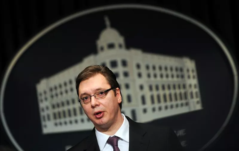 Serbia's deputy Prime minister Aleksandar Vucic speaks during a press conference on January 14, 2014 in Belgrade after Serbian police arrested two former intelligence officers suspected of involvement in the murder of journalist. Slavko Curuvija, a fierce critic of late strongman Slobodan Milosevic, was killed in front of his home in central Belgrade by unknown gunmen on the Orthodox Easter in April 1999, during NATO's bombing campaign against the former Yugoslavia over Kosovo.    AFP PHOTO / ANDREJ ISAKOVIC