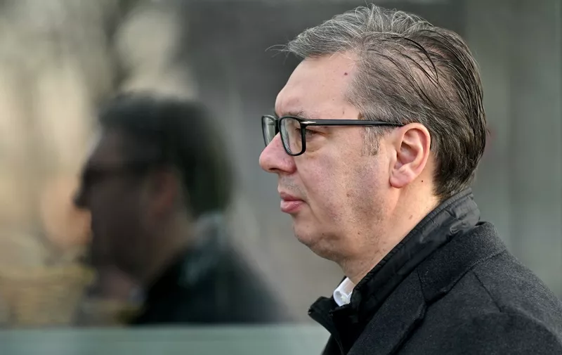 Serbian President Aleksandar Vucic waits outside a polling station in Belgrade on December 17, 2023, during parliamentary and local elections in Serbia. Serbians headed to the polls on December 17, 2023, in elections that will likely see populist President Aleksandar Vucic's ruling party extend its rule, as the strongman promised stability and vowed to curb inflation after months of protests. (Photo by Andrej ISAKOVIC / AFP)