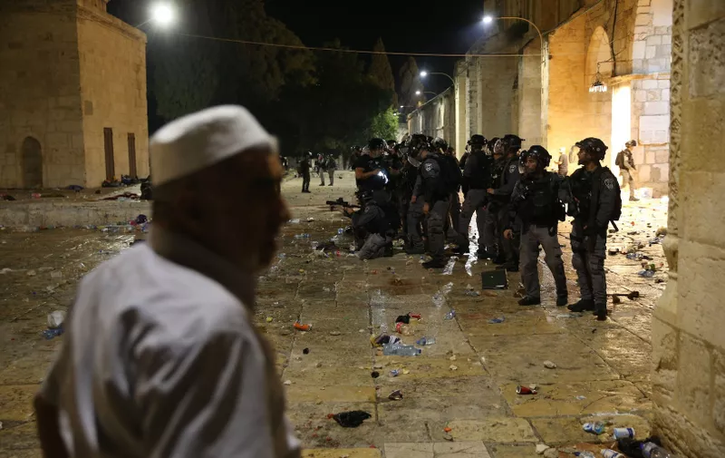 Israeli policemen gather during clashes with Palestinians at the compound that houses Al-Aqsa Mosque, known to Muslims as Noble Sanctuary and to Jews as Temple Mount, amid tension over the possible eviction of several Palestinian families from homes on land claimed by Jewish settlers in the Sheikh Jarrah neighbourhood, in Jerusalem's Old City, May 7, 2021.
Israeli policemen gather during clashes with Palestinians at the compound that houses Al-Aqsa Mosque, Jerusalem, Palestinian Territory - 07 May 2021,Image: 609846832, License: Rights-managed, Restrictions: , Model Release: no, Credit line: Profimedia