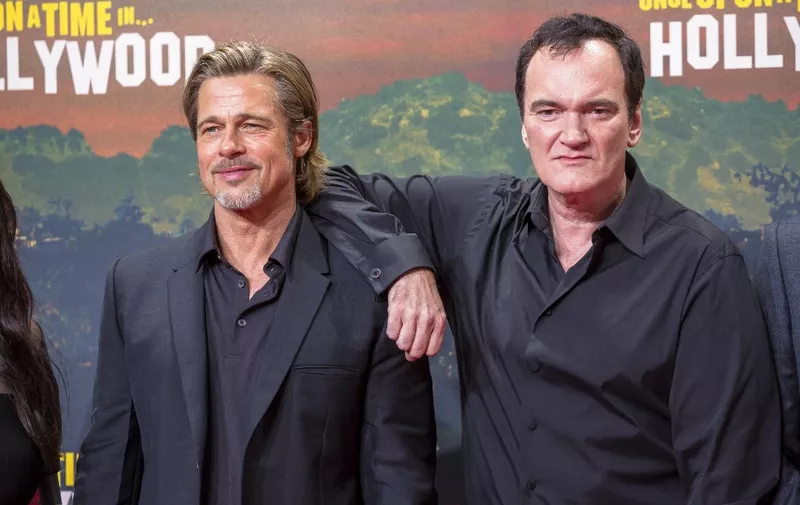 Brad Pitt and Quentin Tarantino (r) attend the German premiere of 'Once Upon A Time in ... Hollywood' at Sony Center in Berlin, Germany, on 01 August 2019. | usage worldwide (Photo by HUBERT BOESL / DPA / dpa Picture-Alliance via AFP)