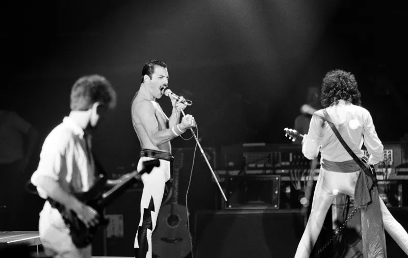 A file picture taken on September 18, 1984 showing Rock star Freddie Mercury, lead singer of the rock group "Queen", during a concert at the Palais Omnisports de Paris Bercy (POPB). / AFP PHOTO / JEAN-CLAUDE COUTAUSSE