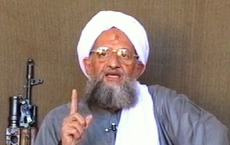 (FILES): This 06 January 2006 video image from footage broadcast by the Qatari news channel al-Jazeera television shows al-Qaeda number two Ayman al-Zawahiri giving a speech at un undisclosed location.  According to Pakistani military sources 13 Januiary 2006, US aircraft attacked a compound known to be frequented by high level al Qaeda operatives. Pakistani officials said  that al Qaeda leader Dr. Ayman al-Zawahiri, Osama bin Laden's top lieutenant, may have been among them.     AFP PHOTO/DSK (Photo by AL JAZEERA TV / AFP)