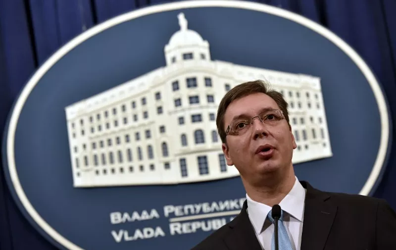 Serbian Prime Minister Aleksandar Vucic gives a press conference with EU European neighborhood policy and enlargement negotiations commissioner on November 20, 2014  after their meeting in Belgrade.
 AFP PHOTO / ANDREJ ISAKOVIC
