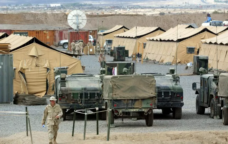A US marine walks in Camp Lemonier, the US military base in Djibouti, 17 December 2002. The military base is taking part in the fight against terrorism in the Horn of Africa.