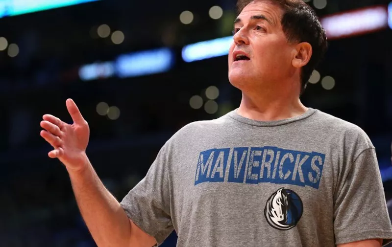 LOS ANGELES, CA - APRIL 12: Dallas Mavericks owner Mark Cuban talks to a referee during a timeout in the game with the Los Angeles Lakers at Staples Center on April 12, 2015 in Los Angeles, California. The Mavericks won 120-106. NOTE TO USER: User expressly acknowledges and agrees that, by downloading and or using this photograph, User is consenting to the terms and conditions of the Getty Images License Agreement.   Stephen Dunn/Getty Images/AFP